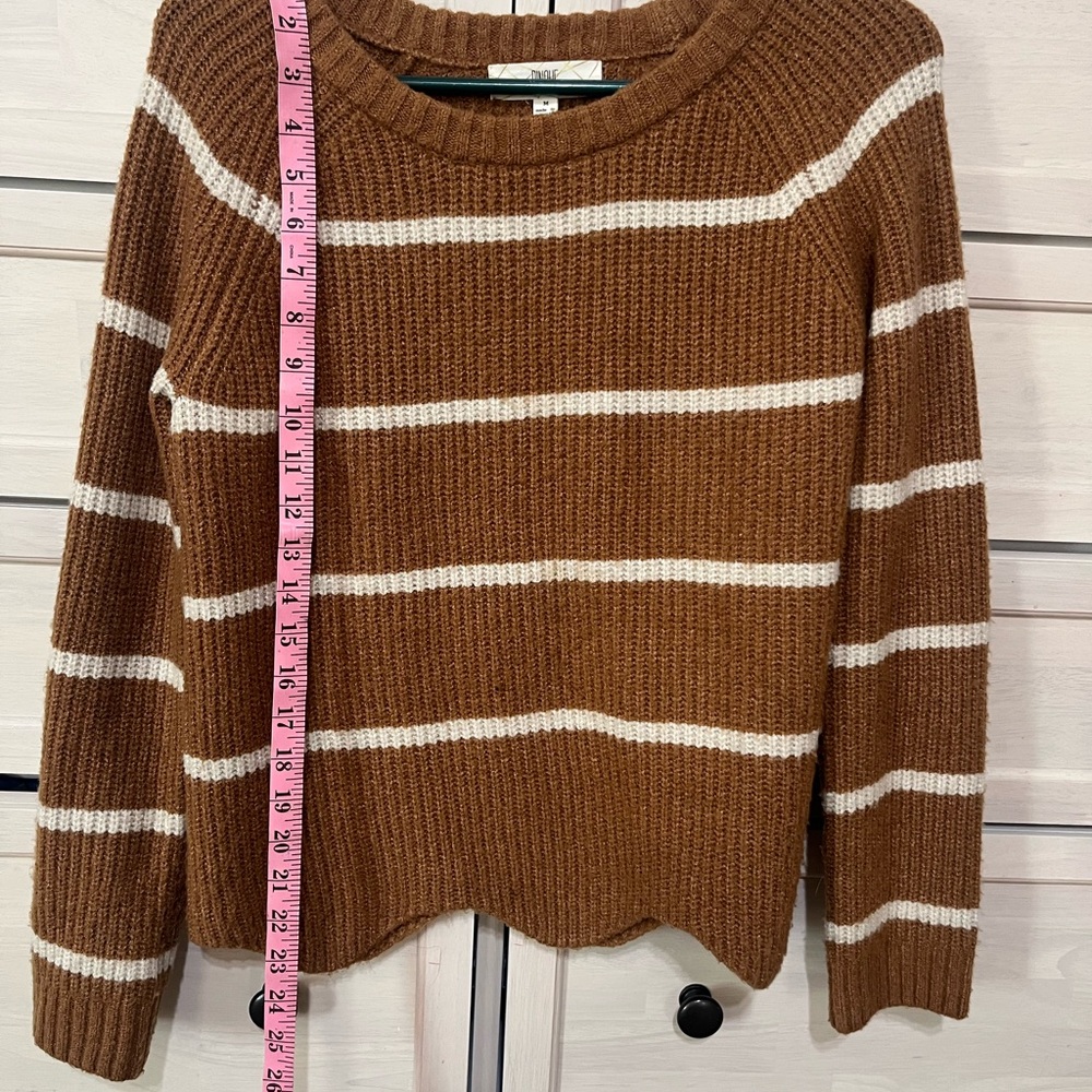 Women’s size M sweater golden with cream color strips,